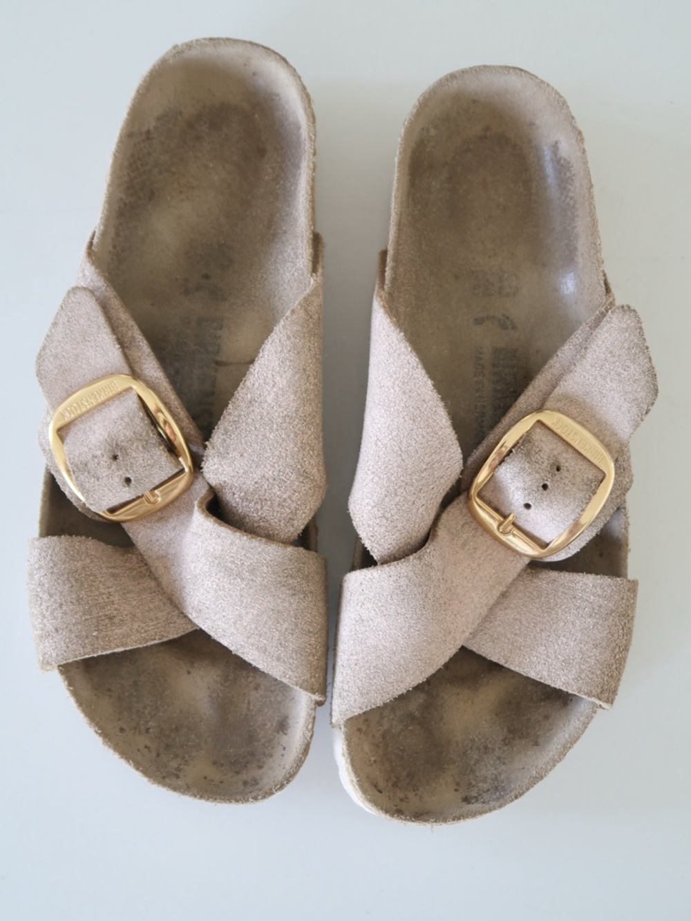 Birkenstock Suede Cross-Band Sandals in Light Metallic Taupe with Gold Buckles